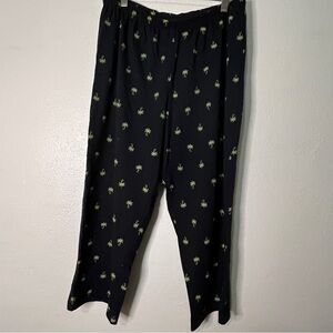 Sunny side up black capris with palm trees. Sz XL. Preowned. EUC.